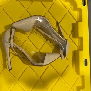 Tan and clear point toe strapped heels